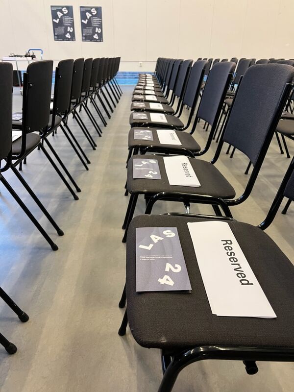 Empty chairs in lecture room. Photo. 