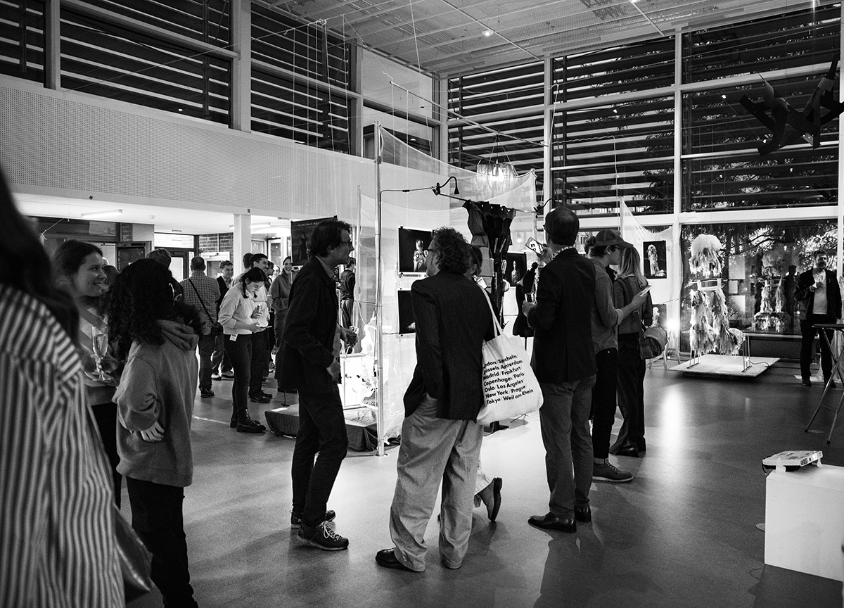 People in Exhibition Hall. Photo. 