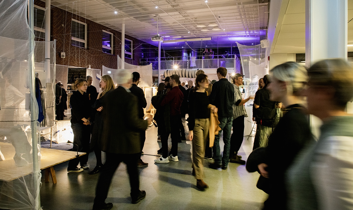 People in Exhibition Hall. Photo. 